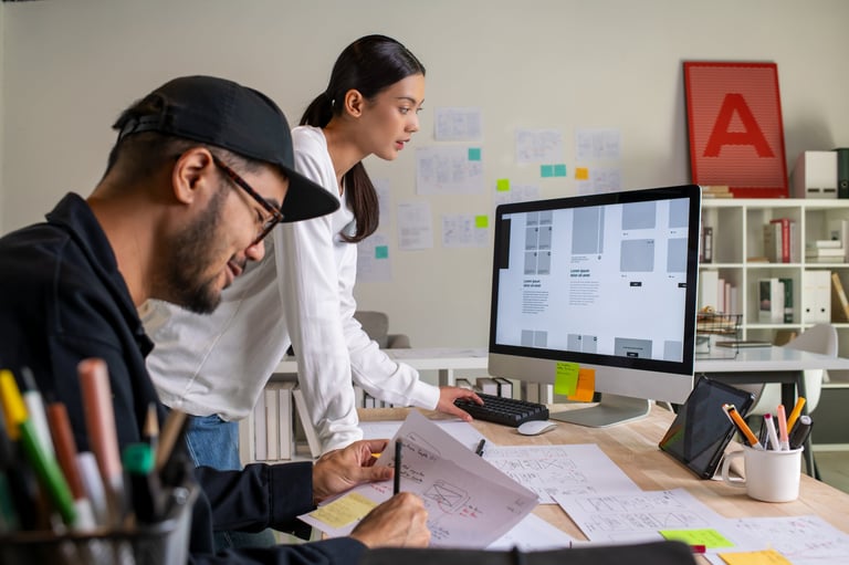 Web design professionals collaborating